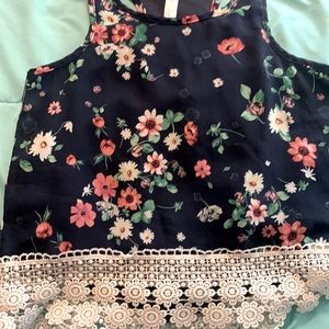 i am selling a blue/white colored floral tank top.